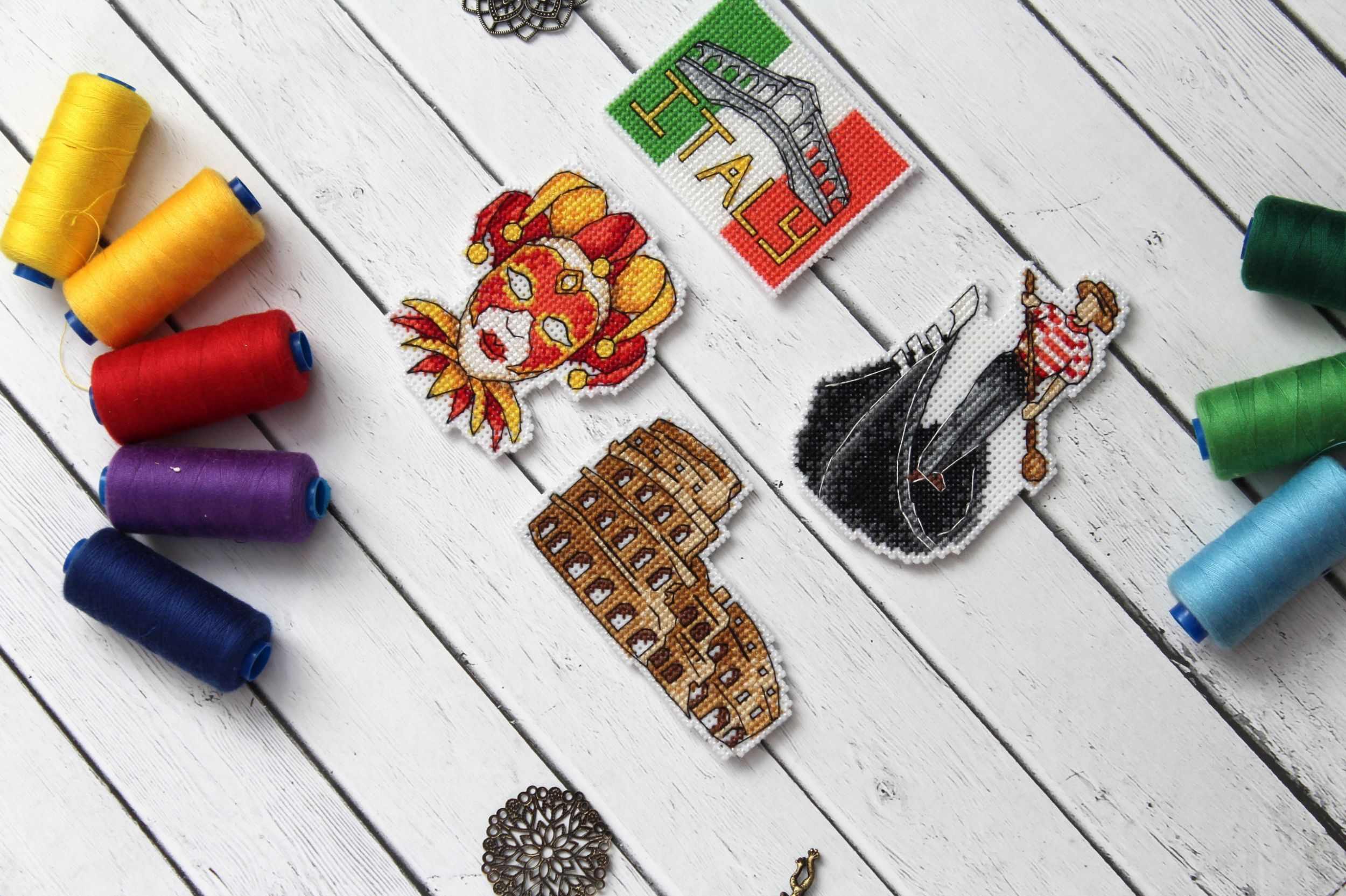 Italy Magnets P-309 / SR-309 Cross Stitch Kit featuring colorful threads and plastic canvas for crafting.